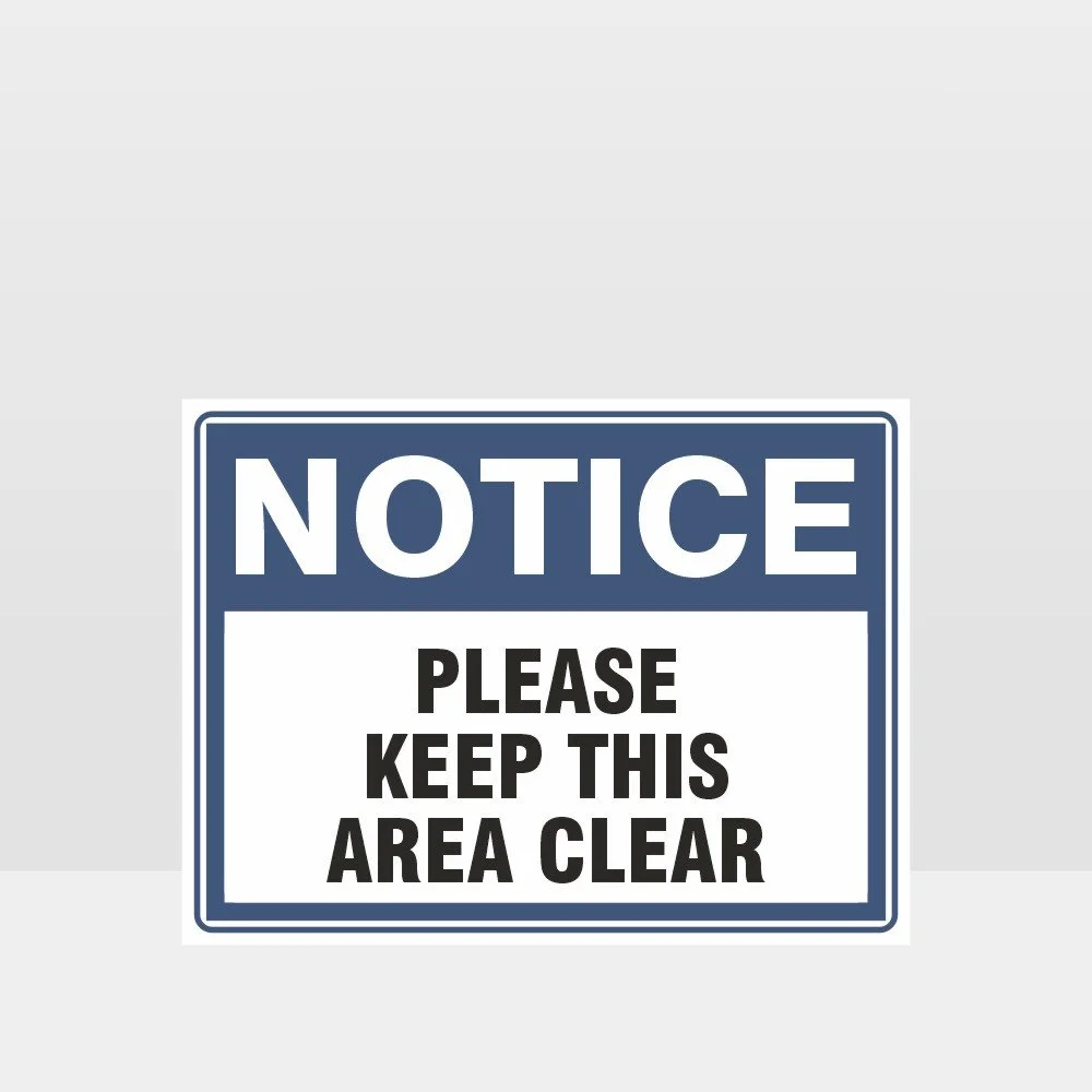 Please Keep This Area Clear Sign