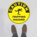 Caution Tripping Hazard Floor Sign